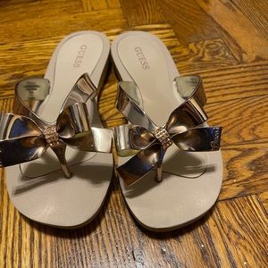 pink/rose gold guess flip flops